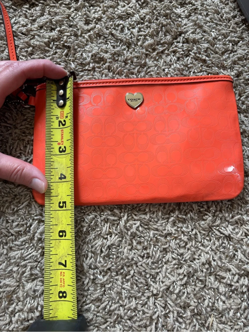 Coach Bright Orange Signature Patent Wristlet